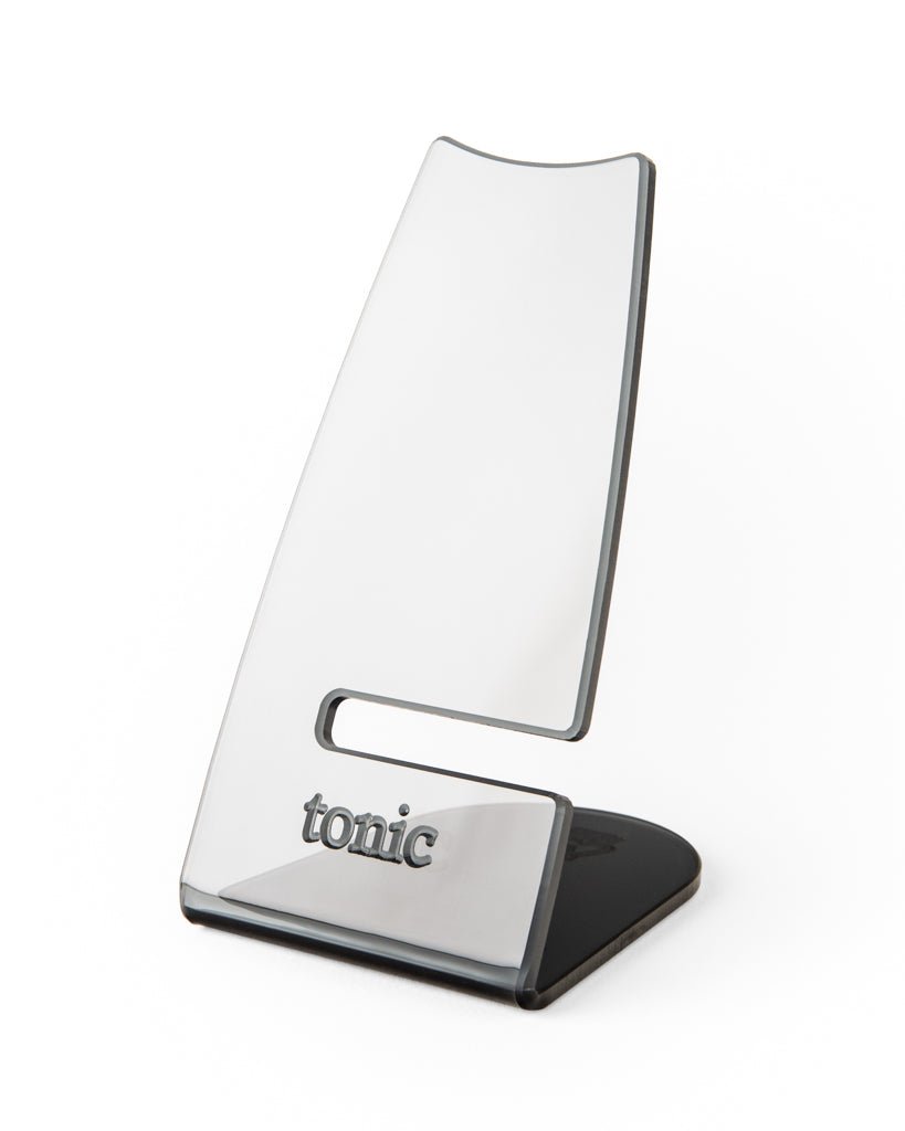 Tonic single piece wristwatch stand made from 100% recycled black translucent acrylic